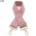 Detailed view of pink woven bag strap with golden metal carabiner and adjustable buckle - Lotus root pink