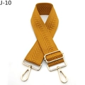 Close-up of mustard yellow adjustable woven bag strap with herringbone texture and gold hardware - Yellow Brown