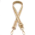 Close-up of geometric jacquard bag strap with gold metal hooks and adjustable buckle - No. 2 Khaki