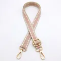Detail view of pink and beige geometric woven bag strap with golden lobster clasps - Style 6 Khaki Pink