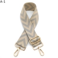 Close-up of adjustable beige and blue chevron bag strap with light gold metal swivel hooks - Beige Gray (A-1)