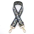 Detail of bohemian floral jacquard bag strap with gold lobster clasps and blue embroidery - No.5 Black Lake Blue