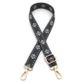 Close-up of black adjustable bag strap with white anchor embroidery and gold metal hooks - No.5 Dark Gray