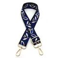 Close-up of ethnic blue floral jacquard bag strap with adjustable gold hardware - Style 7 Black Royal Blue