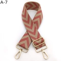 Detail of adjustable beige woven bag strap with red V-pattern and gold metal buckle - Khaki Red (A-7)