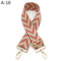 Dettaglio della tracolla intrecciata rossa e bianca con moschettoni dorati regolabili - Chiusura in Argento / Rosso Beige (A-10)