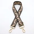Detail of adjustable floral jacquard bag strap with golden metal lobster clasps - Style 11 Black Light Pink