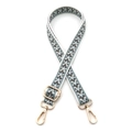 Detail of adjustable bohemian woven bag strap with geometric patterns and gold metal clips - White & Light Green