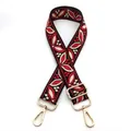 Close-up of bohemian style jacquard bag strap with red leaf pattern and gold metal hardware - Style 23 Black Red