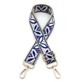Detail of blue and white ethnic floral embroidery on adjustable bag strap with gold buckle - Style 29 Beige Royal Blue