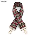 Close-up of floral embroidered wide strap with light gold metal swivel hooks and buckle - No. 10 Black Army Green Rose Floral