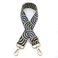 Detail of adjustable wide fabric bag strap with dark green wavy geometric patterns - No.6 Blue Green