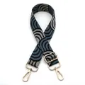 Detailed close-up of woven bag strap No. 17 with blue and grey wave patterns and gold buckle - No.17 Black Base Blue Gray