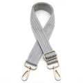 Close-up of light grey chevron patterned bag strap with shiny gold adjustable metal hardware - Light Gray No. 4