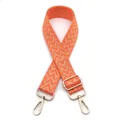 Detail of adjustable 3.8cm wide orange and beige V-pattern strap with gold metal lobster clasp - Orange