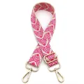 Detail of woven pink geometric guitar strap with gold metal hooks and adjustable buckle - Style 17 Beige Rose Pink (Silver Buckle)