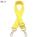 Detail of yellow and white checkered bag strap with golden metal swivel snap hooks - Yellow