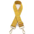 Close-up of yellow and beige checkered strap with gold lobster clasps and buckles - Yellow