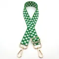 Detail of adjustable green and white checkered woven bag strap with golden metal hardware - Silver Clasp / Green