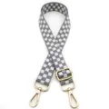 Close-up of grey and white checkered replacement bag strap with golden metal hooks - Gray