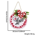 White wooden Love sign hanging plate with red hearts and polka dot bow for Valentine's Day - LOVE Heart Round Sign