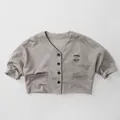 Detail of grey knitted kids cardigan with V-neck, black buttons and apple embroidery - 80cm / Beige Khaki