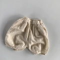 Dettaglio dei calzoncini a palloncino in cotone e lino con vita elastica per bambini - 80cm / Bianco Sporco