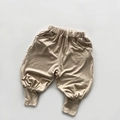 Détail du pantalon harem léger en coton pour enfants avec taille élastique en beige - 80 / Beige