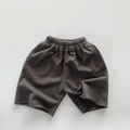 Detalle de pantalones cortos grises para niños con cintura elástica y tejido de rizo - 80cm / gris oscuro
