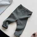 Detail view of dark grey stretch cotton leggings for babies with elastic waistband - 80cm / Dark Gray