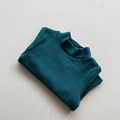 Detailed close-up of dark teal kids' knit sweater showing soft texture and high-neck - Aqua Blue / 80cm