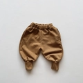 Flat lay of brown cotton children's sweatpants with elastic waist and ribbed cuffs - 80cm / Khaki/Earth Yellow