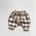 Detail view of elastic waistband on brown plaid cotton linen harem pants for kids - Brown Plaid / 90cm