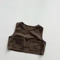Detailed view of dark brown canvas kids utility vest featuring two large front pockets - Dark Coffee / 80cm