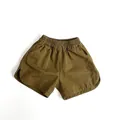 Detail view of cotton shorts showing elastic waist and curved hem with white stitching - 80cm / Army Green