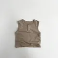 Detail of coffee brown baby vest featuring a ribbed henley neck and soft cotton texture - 80cm / Khaki