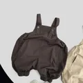 Peto de algodón marrón para bebé con puños elásticos y detalles de botones laterales - 80cm / Café oscuro