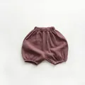 Detail of baby cotton gauze bloomers in dusty purple with breathable crinkled texture - 80cm / Purple