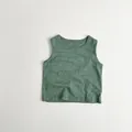 Close-up of deep green slub cotton kids tank top showing textured breathable fabric - 80cm / Dark Green