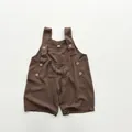 Detail of dark brown linen cotton baby overalls with rustic wooden buttons and small pocket - 80cm / Brown