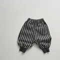 Close-up of boys' striped cotton trousers showing elastic waistband and fabric texture - 80cm / Dark Gray