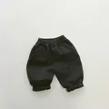 Detail view of children's fleece casual trousers with elastic waistband and side pockets - 80cm / Dark Gray