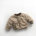 Close-up of baby padded top with contrast ribbed collar and a brown-trimmed front pocket - Light Khaki / 100cm