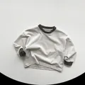 Detail of children cotton long sleeve tee with contrast brown ribbed collar and cuffs - 80cm / Grey-Beige