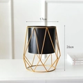 Detail view of modern geometric metal planter with 17cm diameter and 26cm height - Geometric Black Flower Pot / Large
