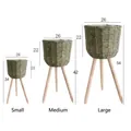 Three sizes of Raffia rope woven flower baskets on wooden tripod stands for home decor - Raffia Green Small Medium Large