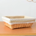 Detailed view of woven rectangular basket featuring a lace-trimmed cotton linen lining - Natural Wood Rectangle