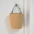Handwoven rattan-style wall hanging planter in natural light brown with leather handle - Small / Natural Jute Color