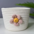 White woven cotton rope storage basket with a pink corduroy flower decorative accent - White Pink Floral