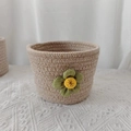 Handmade woven cotton rope storage basket in beige and white with a green floral detail - Wave Pattern Green Flower Style